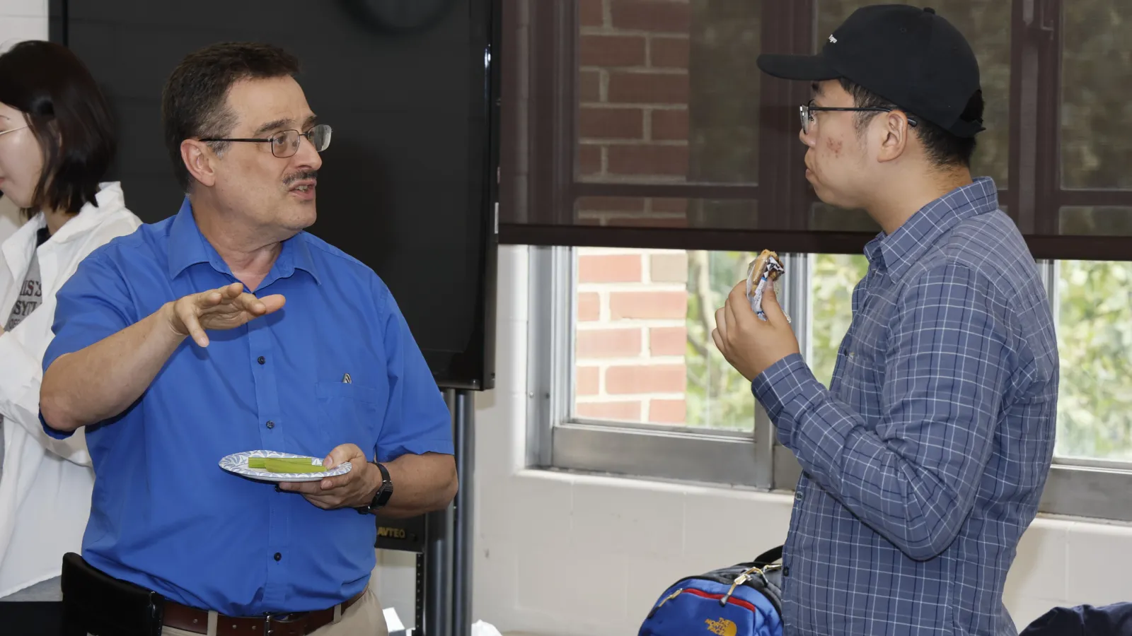 Teacher and student talking